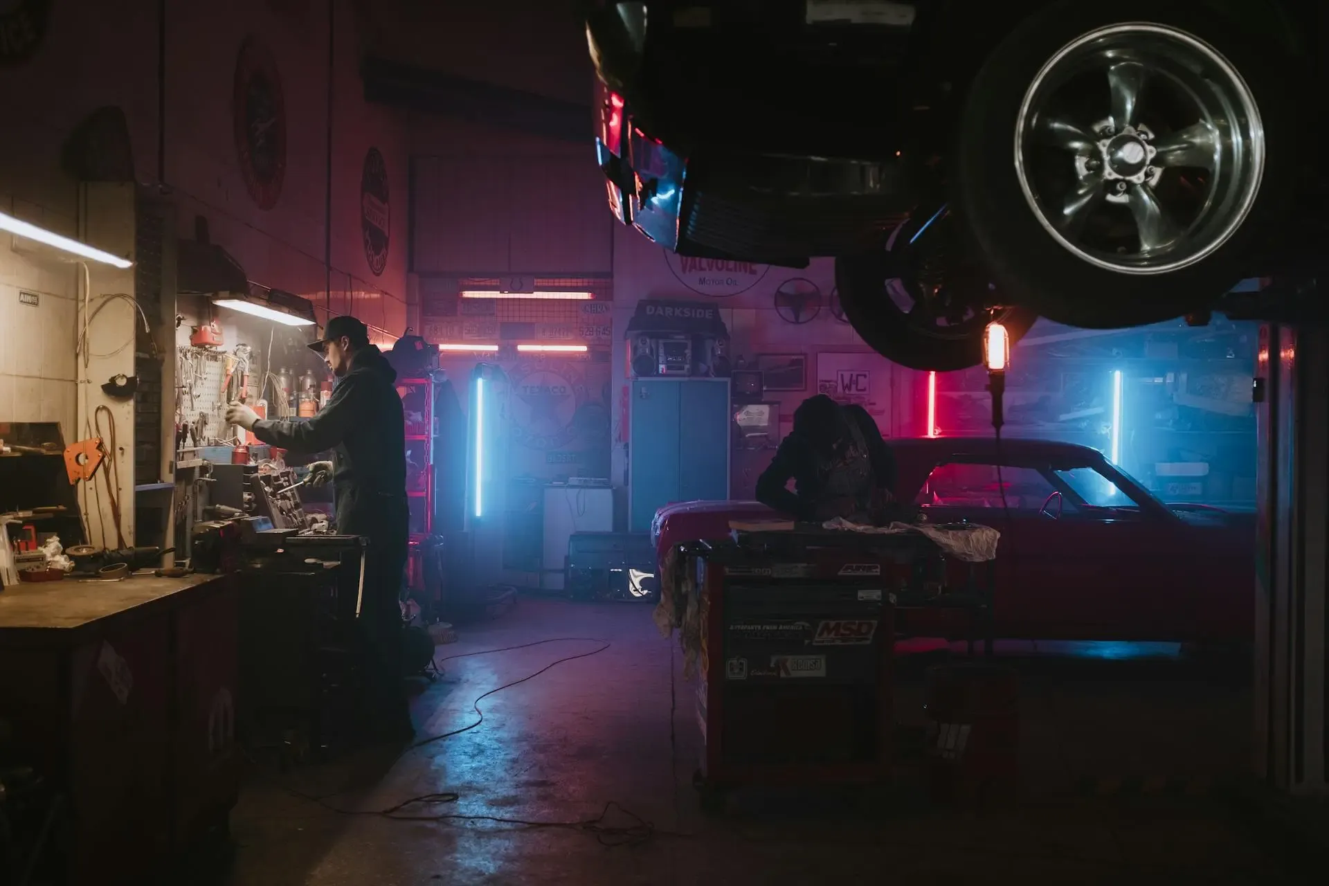 Mechanic working under car